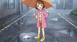 ピンクのレインコートを着たパクチーちゃんの写真